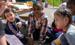 Group of Wolverhampton school children using Discover Warburtons Wheat Farm in a Box